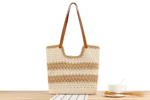 Close-up detail shot of the woven crochet tote bag showcasing the intricate knit texture and leather strap.