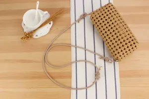 Chic hollow woven crossbody bag for women, perfect for daily casual wear and beach vacations.
