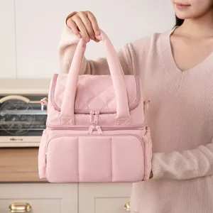Pink quilted insulated lunch bag for women, double-layer thermal tote handbag for work.