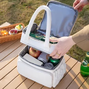 White quilted double layer insulated lunch bag with spacious compartments for work and daily use.