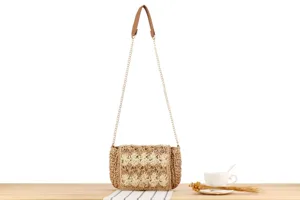 Handmade woven straw square bag detail view, perfect for casual commuting beach vacation style.