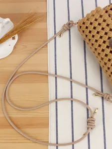 Candy-colored hollow woven crossbody shoulder bag for women, daily casual seaside vacation style.