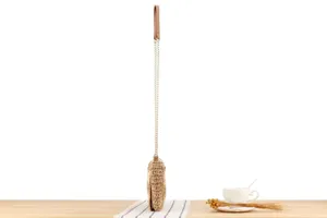 Detailed side view of a stylish handmade woven straw mini shoulder bag with chain strap and handle.