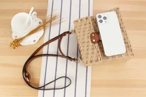 Handmade straw woven crossbody bag, casual beach vacation structured handbag for women.