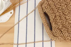 Handwoven straw shoulder bag with metallic chain strap casual beach vacation handbag style