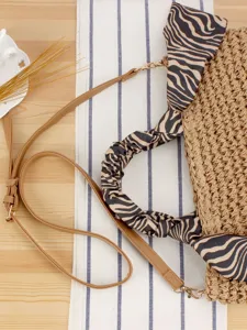 Woven straw crossbody bag for women with zebra print scarf handle, casual summer beach shoulder bag.
