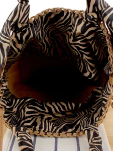 Womens woven straw handbag with stylish zebra print lining, casual daily beach shoulder bag.