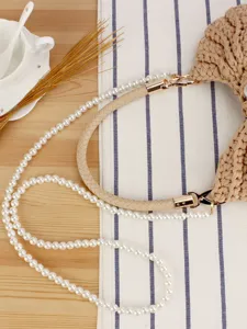 Handmade woven women handbag with pearl chain and leather strap for casual daily vacation.