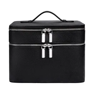 Dubbellaagse zwarte PU lederen cosmetische tas grote make-up opbergdoos voor reizen en thuis.