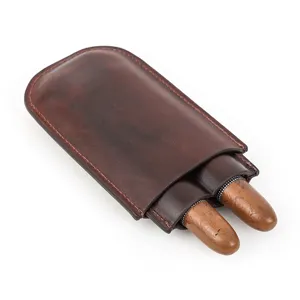 Brown leather cigar case holding two cigars, portable two-in-one travel humidor pouch.