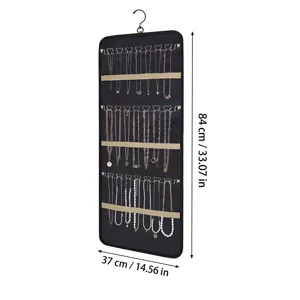 Organizador de joyas colgante con ganchos metálicos y terciopelo negro para collares y aretes.