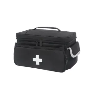 Detail view of portable black first aid medical storage bag with durable zipper and handle.