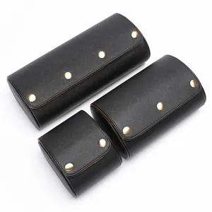 Zwarte lederen horloge reis etui set met drukknoppen voor luxe horloges en sieraden opslag.