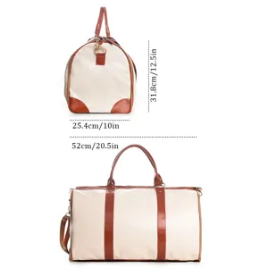 Large capacity travel duffel bag with brown leather trim, detailed dimensions and durable design.