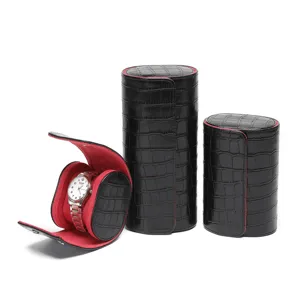 Zwarte krokodil PU lederen horloge opbergdoos etui met rode fluwelen binnenkant detail.