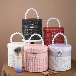 Luxe tweed cosmetische tas met parelhandvat, grote ronde opbergdoos voor reizen.