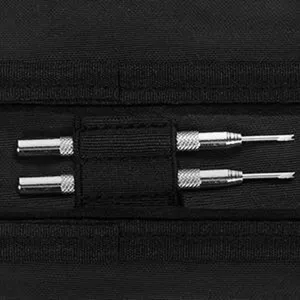 Detailed view of the watch band storage bag showing elastic slots and metal tool inserts.