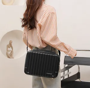Black hard shell shoulder bag for Nintendo Switch OLED portable travel storage accessory.