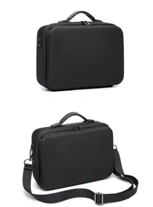 Black hard shell storage bag portable shoulder carrying case for drone accessories.