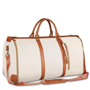 Gran bolsa de viaje de cuero PU con ribete marrón y detalle de borla para almacenamiento de mujeres.