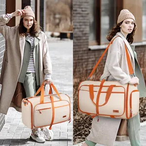 Gran bolsa de viaje de cuero PU para mujer, bolsa de ropa de cabina de moda con correas naranjas.