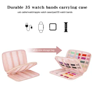 Detailed view of pink watch band storage case interior slots and mesh pockets for cables.