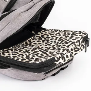 Grey multi-functional backpack with a leopard print compartment for daily travel.