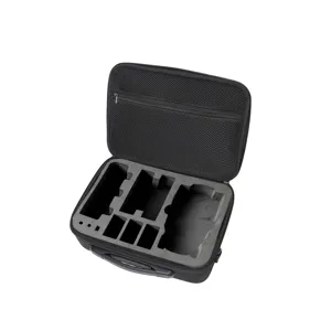 Black portable drone carrying case with custom foam slots and zipper mesh pocket.
