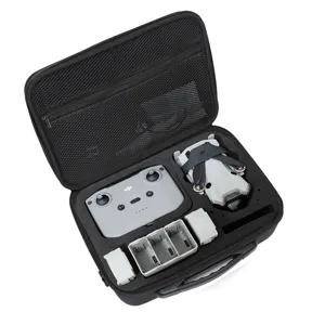 Black storage carrying case with custom foam slots for drone, remote controller, and batteries.