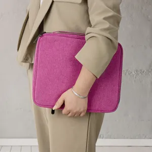 Portable pink zipper storage bag for travel and daily organization, compact and convenient.