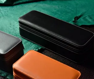 Detailed view of luxury leather watch box, multi-slot portable mechanical watch storage case.