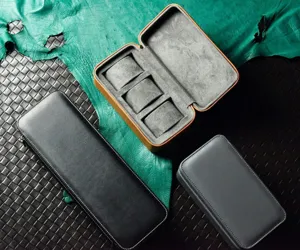 Premium multi-slot travel watch storage box detail, elegant leather finish and soft interior.