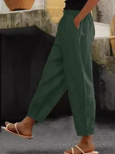 Casual cotton linen women trousers with convenient side pockets and comfortable elastic drawstring waist.
