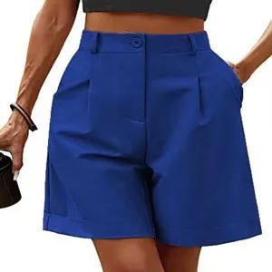 High-waisted royal blue wide-leg shorts detail, featuring pleated design and front button.