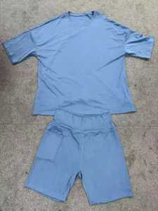 Casual comfortable two-piece set featuring a loose short-sleeve top and shorts with pocket.