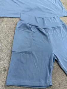 Blue ribbed lounge set detail showing side pocket and soft fabric texture for casual wear.