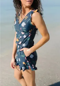Floral print V-neck one-piece swimsuit with ruffles and side pocket for women beach wear.