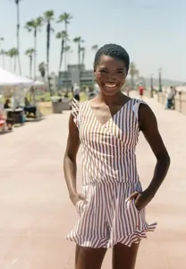 Stylish striped sleeveless romper with V-neck and pockets, perfect for summer beach and vacation.