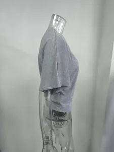 Grey short sleeve tee detail, side view of casual solid color summer top for daily wear.