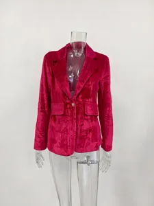 Detailed view of an elegant magenta velvet slim-fit blazer for women shown on a mannequin.
