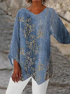 Loose blue long sleeve V-neck top featuring elegant gold floral print detail for summer.