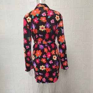 Back view detail of women long sleeve floral print shirt dress with belt, casual chic style.