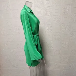 Green pleated long sleeve shirt dress with belt detail, elegant women casual short dress wear.