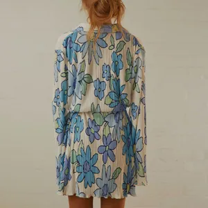 Detailed view of the floral printed pleated long sleeve shirt dress for women elegant daily wear.
