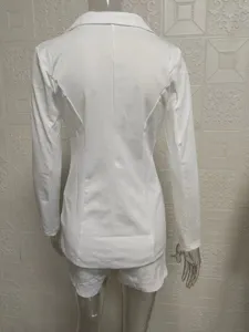 Back detail of women white blazer and shorts two piece suit, casual commuting style.