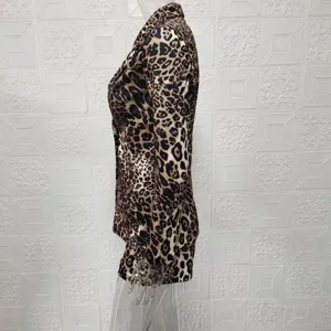 Leopard print blazer and shorts set detail view, stylish women fashion two-piece outfit.