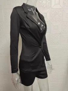 Detailed view of women casual blazer and shorts two-piece set, elegant commuting style black suit.