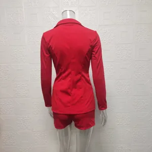Red two piece blazer and shorts set, casual commuting style women's suit detail view.