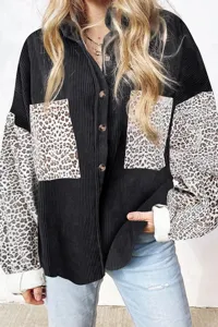 Close-up detail showing the leopard print patchwork sleeve and corduroy texture of the shirt.