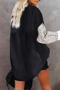 Detail view of women casual leopard print sleeve corduroy jacket lapel shirt top.